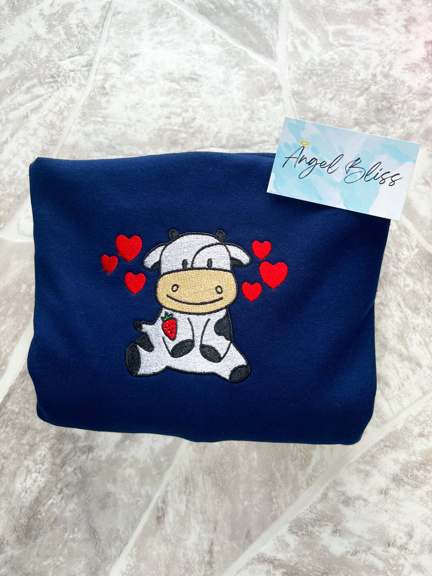 Black and white Strawberry Cow embroidery design